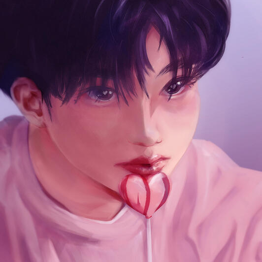 A blushing boy resting his lips on a lollipop